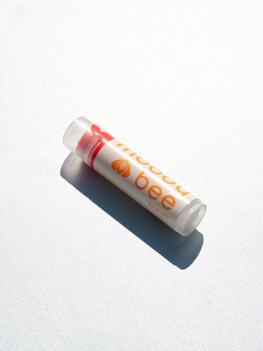 "buzz off" tinted lip balm